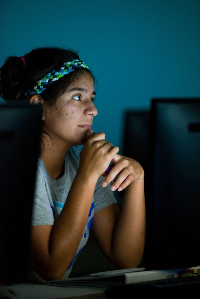 student working on a computer