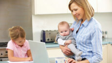 Mom with kids using computer