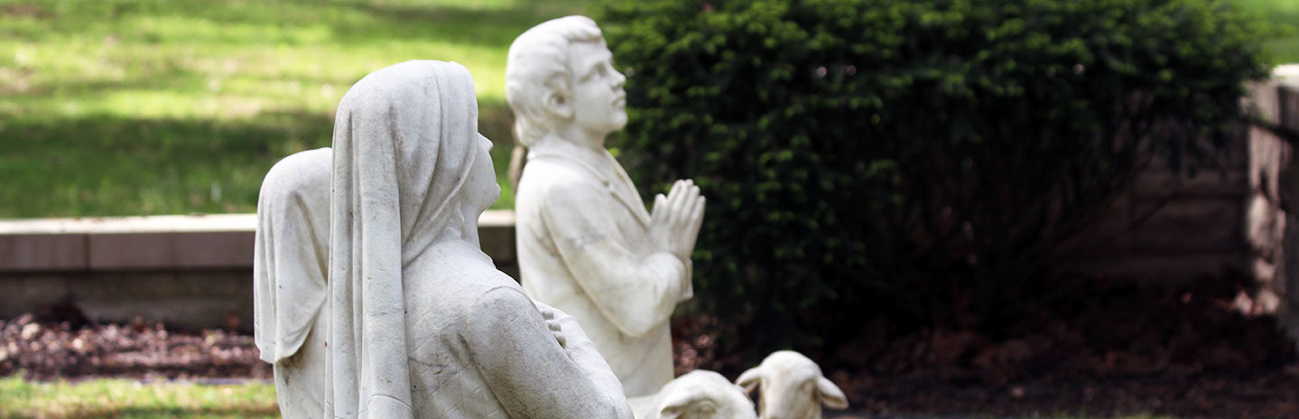 Statues in prayer at the Lady of Fatima Shrine