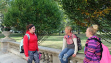 Students standing on the porch of Guerin