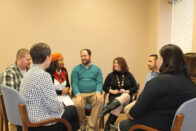 graduate students having a discussion
