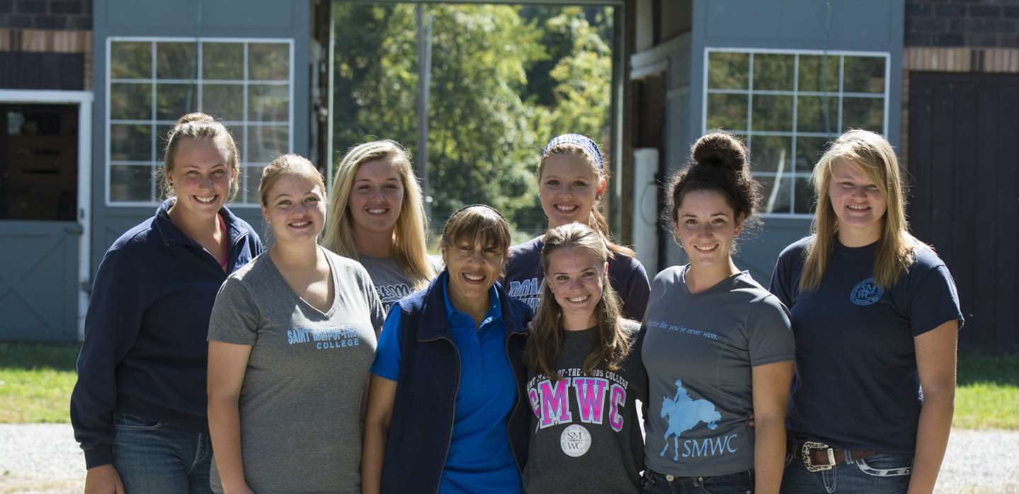 Group of equine students outside of the barn