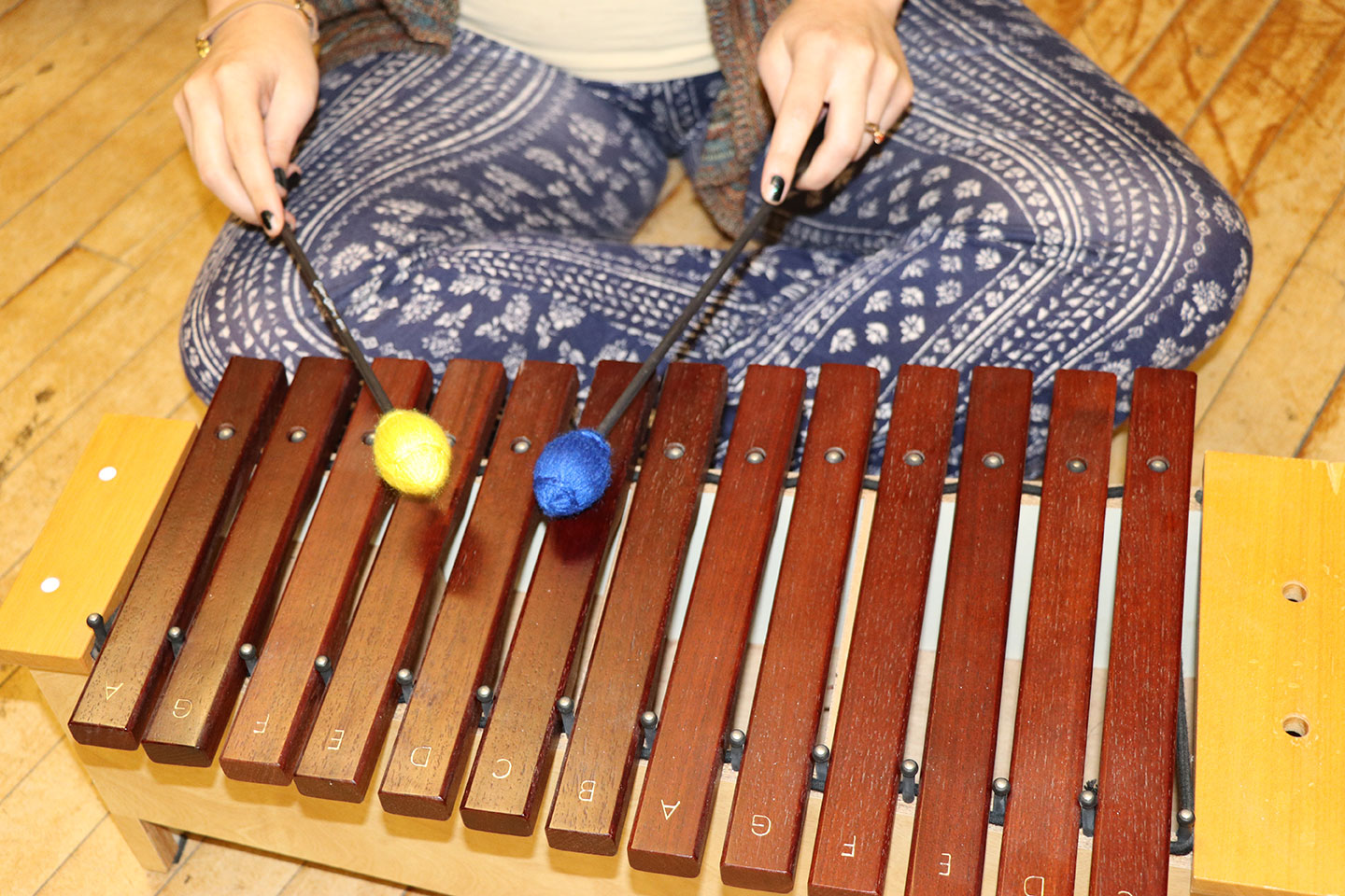 graduate student playing an instrument