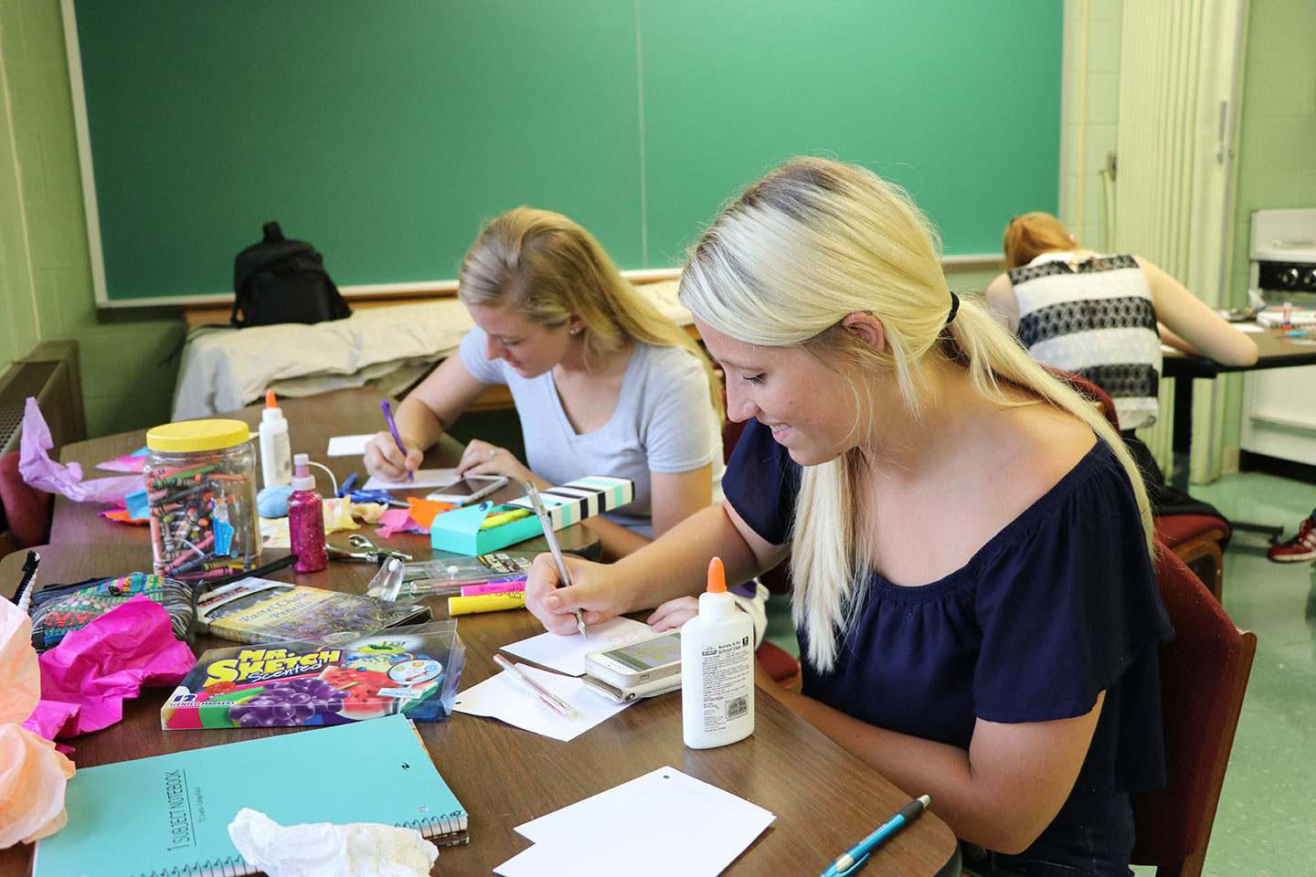 Graduate students working on an art project