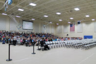 The gym filled with people for commencement