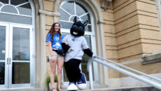 Onyx with a student on the steps of Le Fer