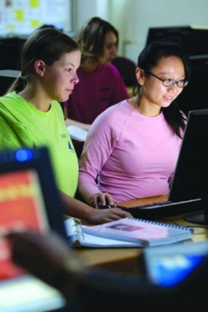 two students in computer lab