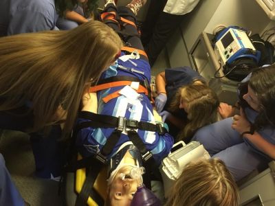 Nusing camp students riding in an ambulance