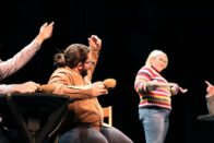 Students rehearsing a scene from The Spitfire Grill in the Cecilian Auditorium