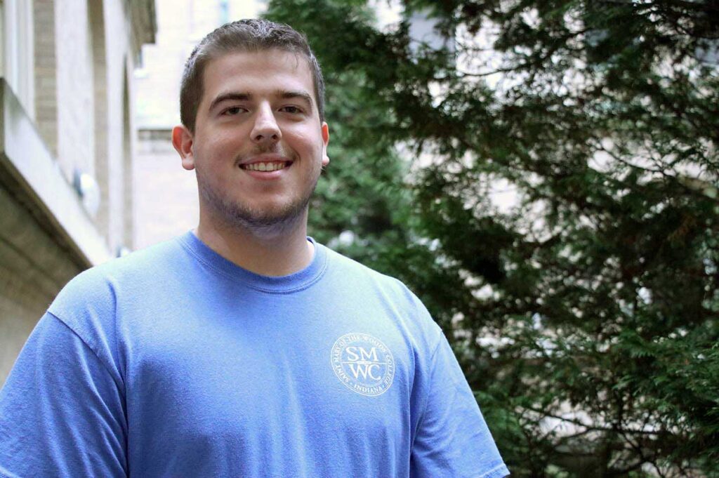 Closeup of Austin Sievers standing in the Guerin Courtyard