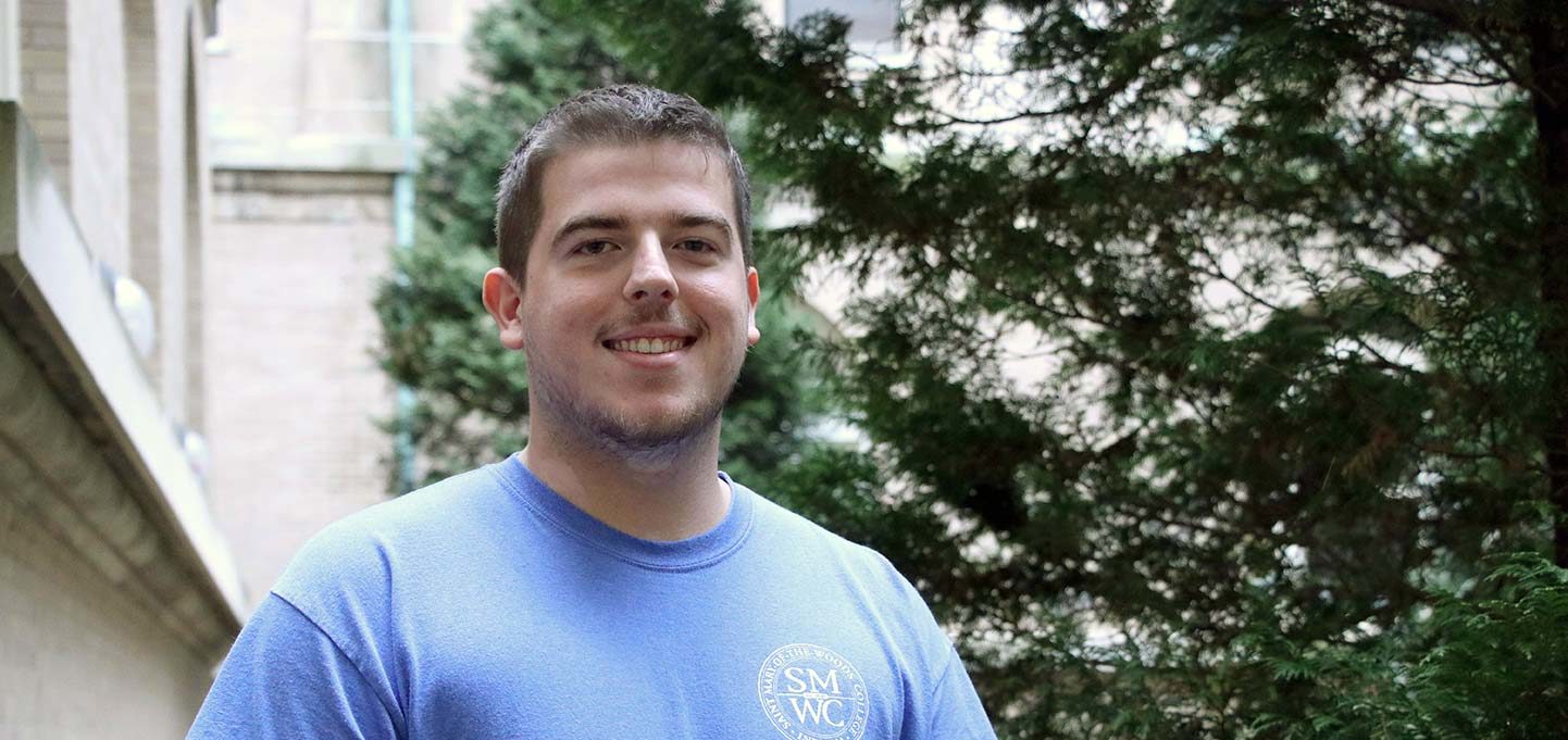 Austin Sievers standing in the Guerin Courtyard