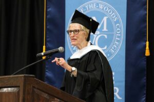 Annette “Mickey” Lentz addressing graduates from the commencement podium
