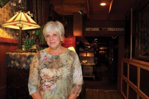 Diane Richards standing in Stables Steakhouse