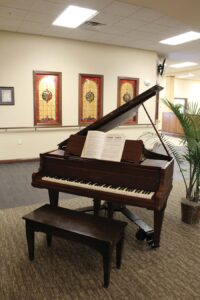 Piano in the lobby of Athenian Properties