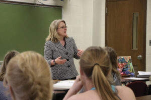 Meredith Williams giving a classroom lecture.