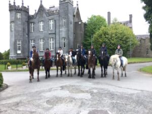 SMWC students and faculty just after a horseback ride through the Slieve Bloom mountains.