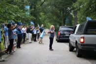 President King and many of the SMWC faculty and staff greet incoming students as they arrive for move-in day.