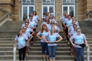 All of the orientation leaders standing on the front steps of Le Fer Hall