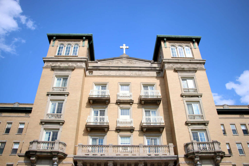 View of the front of Le Fer Hall, looking up at the towers.