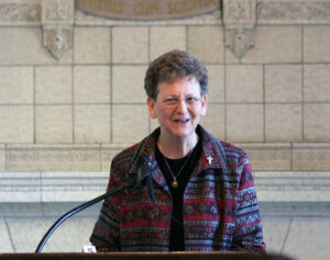 Sister Dawn speaking at the event in Sullivan Parlor