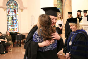 Kristin and her Ring Presenter hugs after receiving her ring