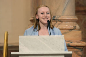 Yeazel speaking at a podium