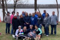 Group of students and family at the lake