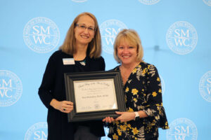 Tracy Richard holding award with President King