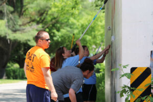 SMWC staff painting the viaduct