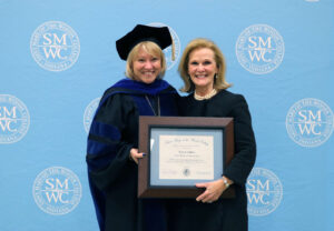 Lubbers and President King holding the award