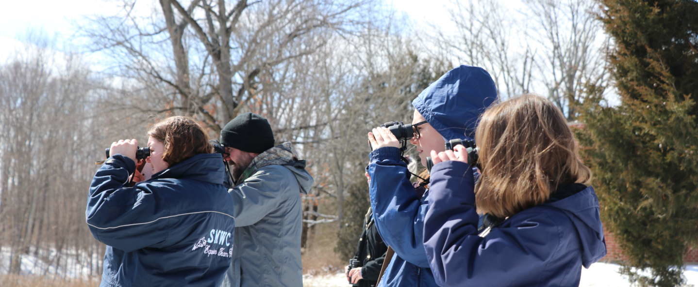 Environmental Science - looking thru binoculars