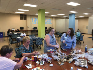 Some alumni bagging cookies.