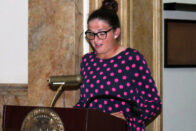 Mannah Mace speaking at the podium