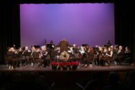 John McIntyre directing the band