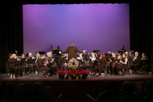 John McIntyre directing the band