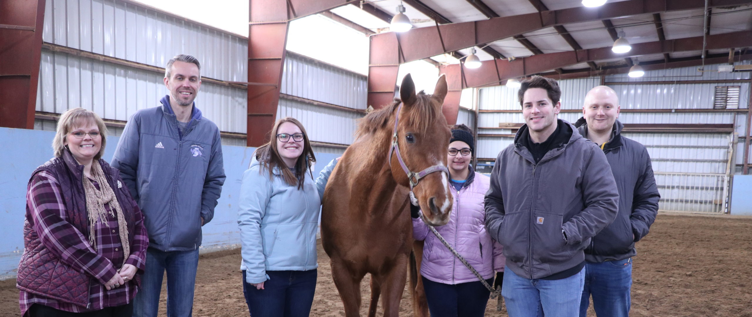 group of WVLI participants with a horse
