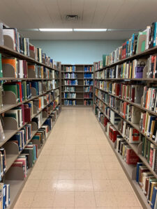 Shelves of Rooney Library.