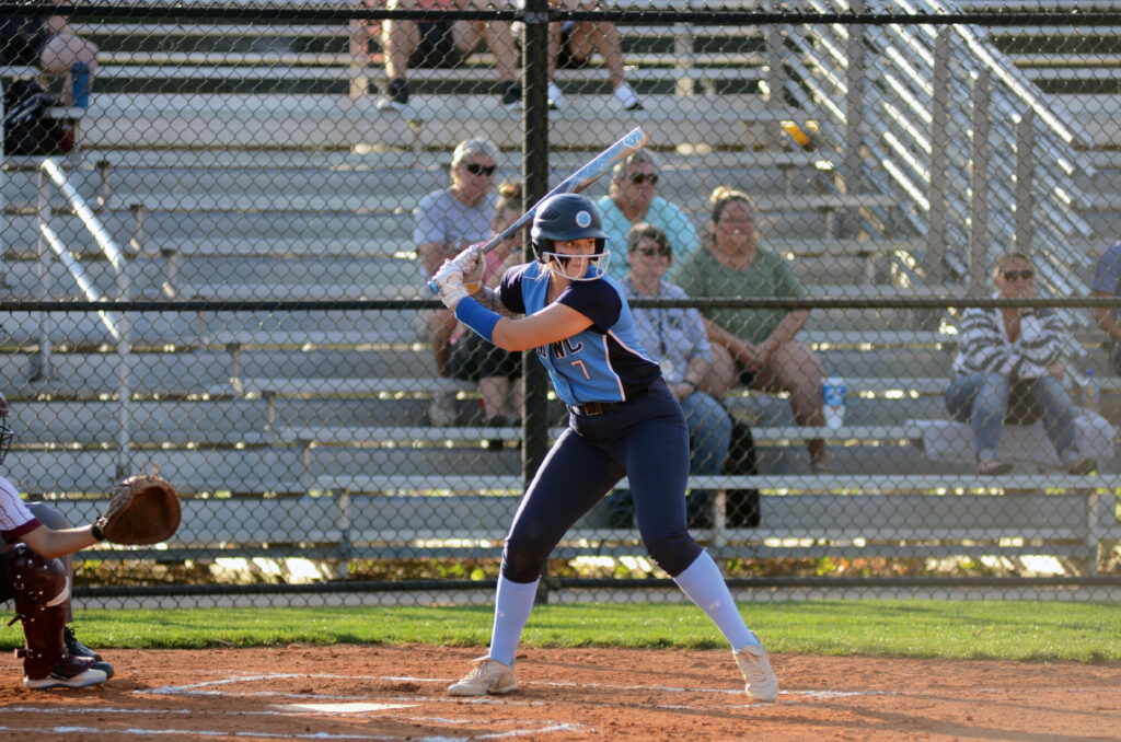 Softball player readying to make a strike