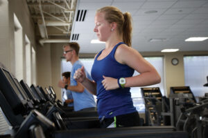 Student exercising on treadmill