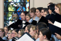 Closeup of chorale performing in the church