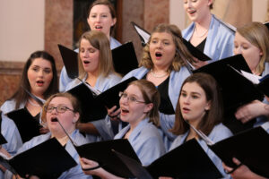 Closeup of chorale singers during a consert