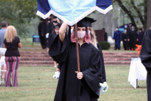 Pache carrying in a SMWC banner during Ring Day