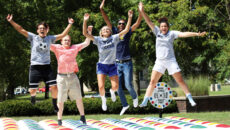 Students having fun with inflatable twister game