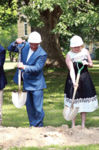Schmidt and King breaking ground at the building site