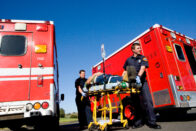 Paramedics with a patient on a stretcher