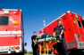 Paramedics with a patient on a stretcher
