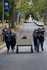 A team competing in the bed races