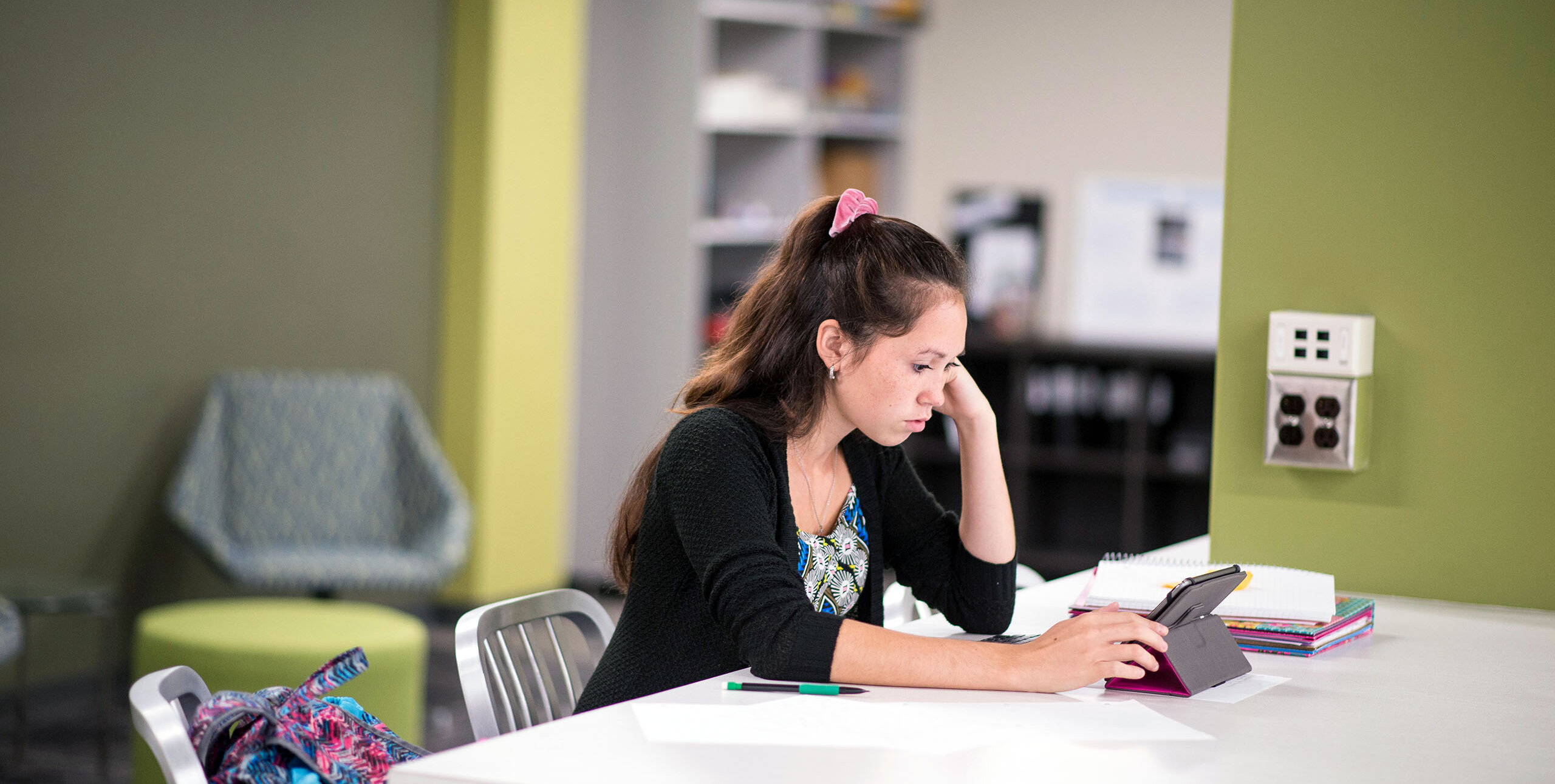 A student studying in the LRC