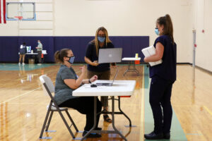 A student receiving their new iPad