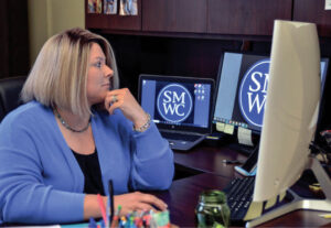 Jaclyn Walters at her desk